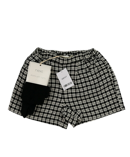 Nové kraťasy s punčocháčemi Next