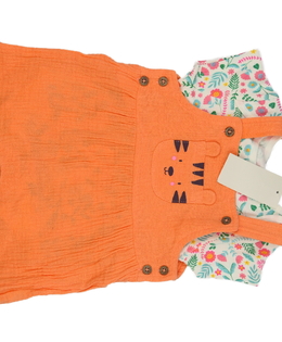 Nový oranžový overal a bílé květinové body 