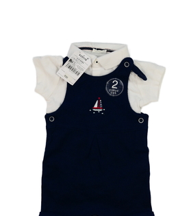 Nové bílé body a modrý overal Next