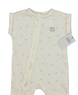 Nový krémový overal s hvězdami George