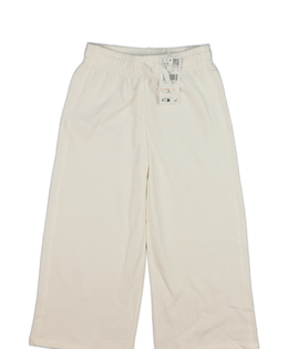 Nové krémové zvonové tepláky 