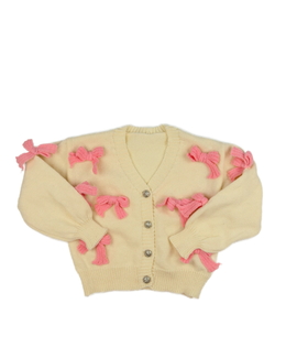 Krémový svetr s růžovými mašlemi 