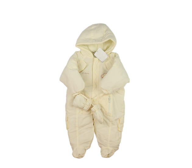 Nová krémová kombinéza 