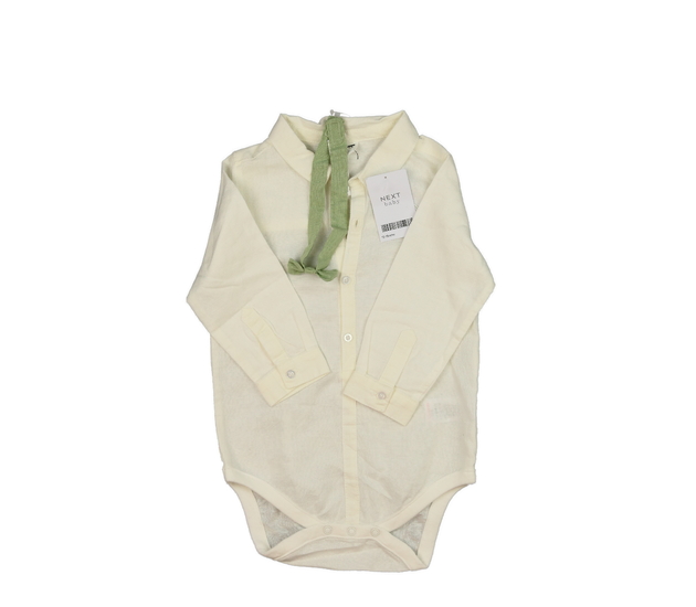 Nové krémové košilové body s čelenkou Next