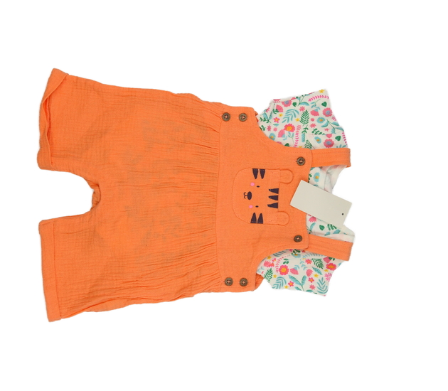 Nový oranžový overal a bílé květinové body 