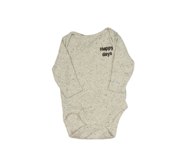 Šedé melírované body s nápisem Next