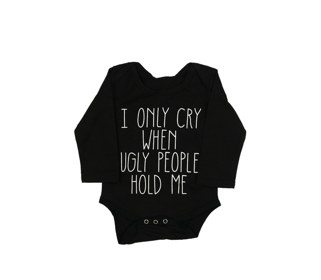 Černé body s vtipným nápisem 