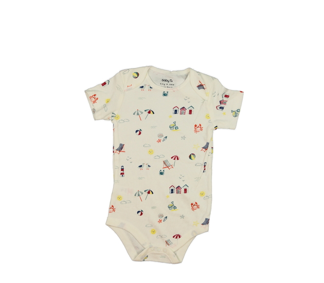 Krémové body s motivem pláže Tu 