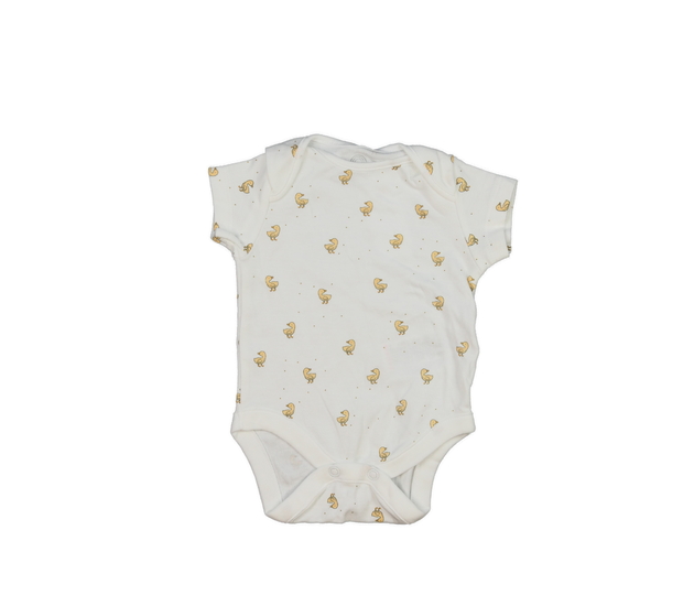 Krémové body s kačenkami Next