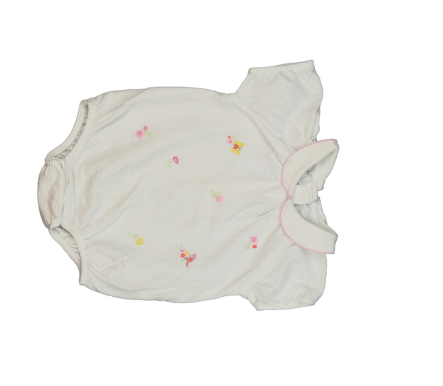 Bílé body s květinami a límečkem Nutmeg