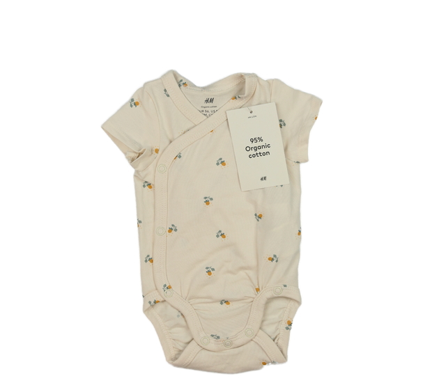 Nové světle hnědé květinové body H&M