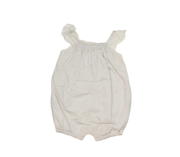 Bílý overal se vzory