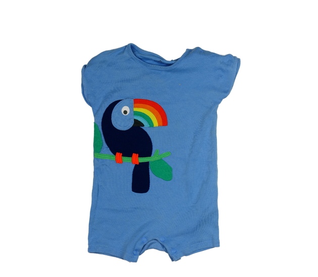 Modrý overal s ptákem Next