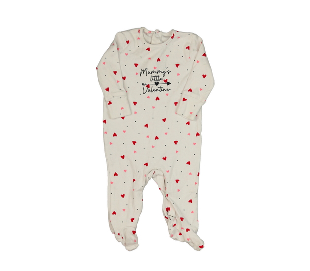 Bílý overal se srdíčky 