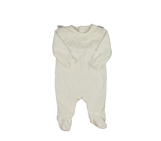 Bílý overal s volánky 