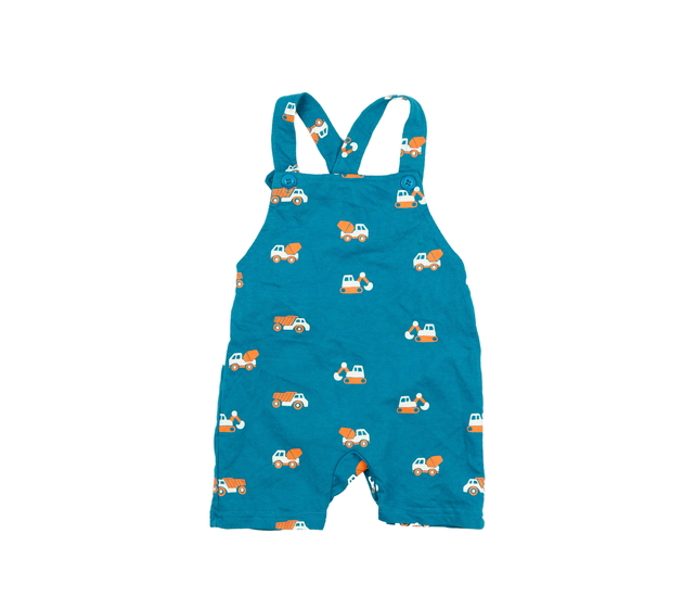 Modrý overal se stavebními stroji