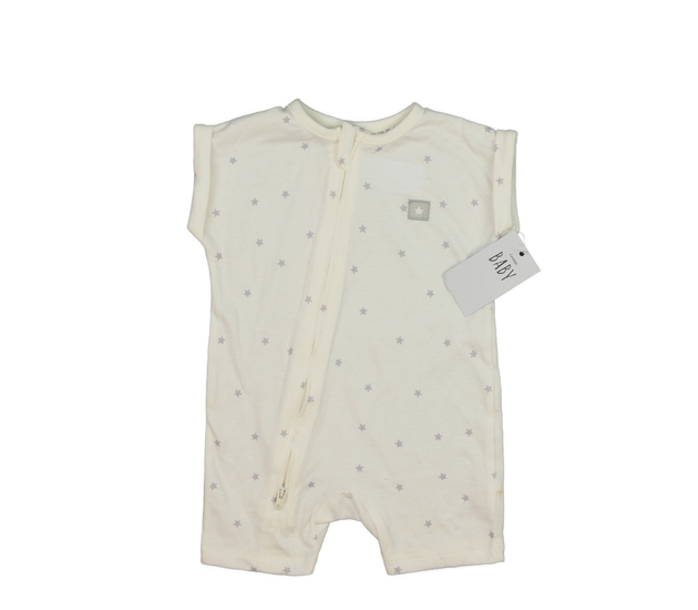 Nový krémový overal s hvězdami George