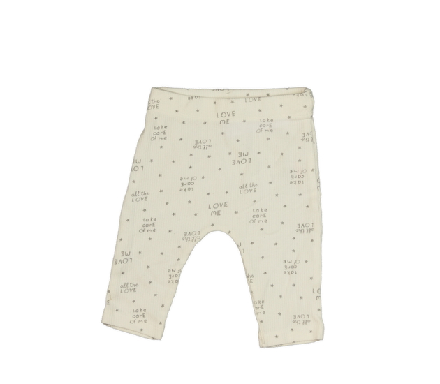 Krémové legíny s nápisy George