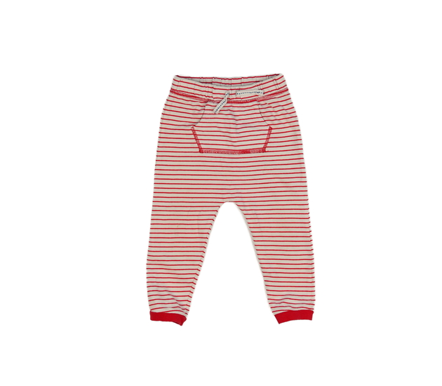 Krémové tepláčky s červenými pruhy Tu 