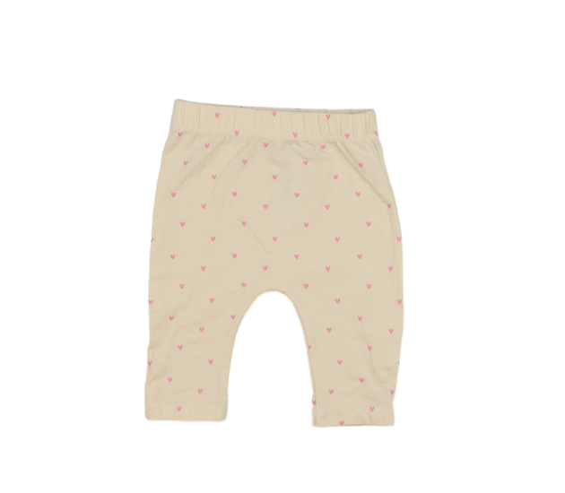 Krémové legíny se srdíčky George