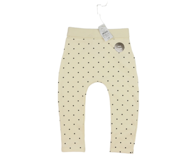 Nové krémové tepláčky s puntíky Nutmeg