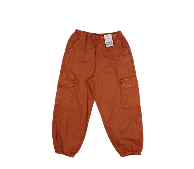 Nové oranžové volné kalhoty Next