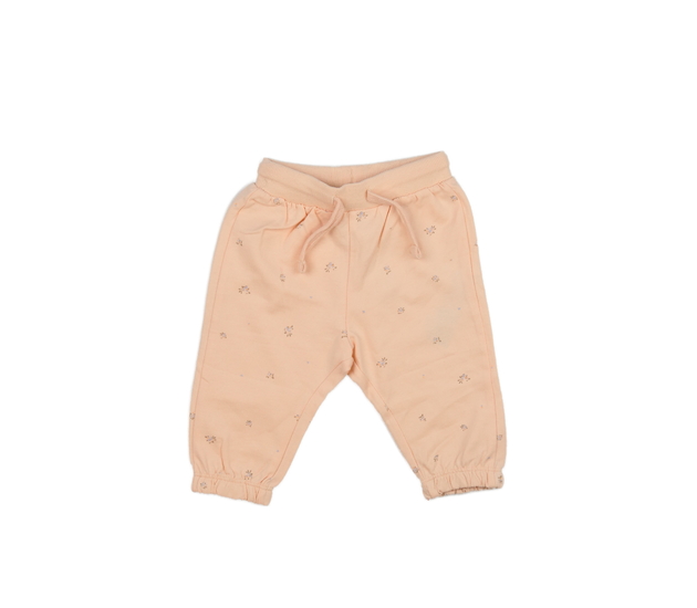 Světle růžové květinové tepláky 