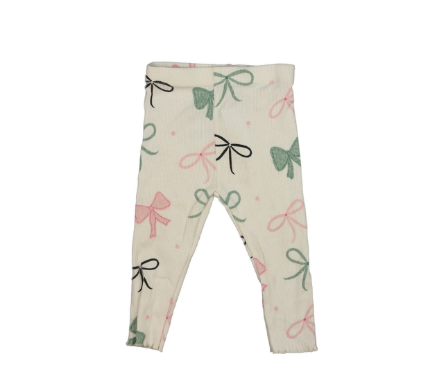 Smetanové legíny s mašlemi