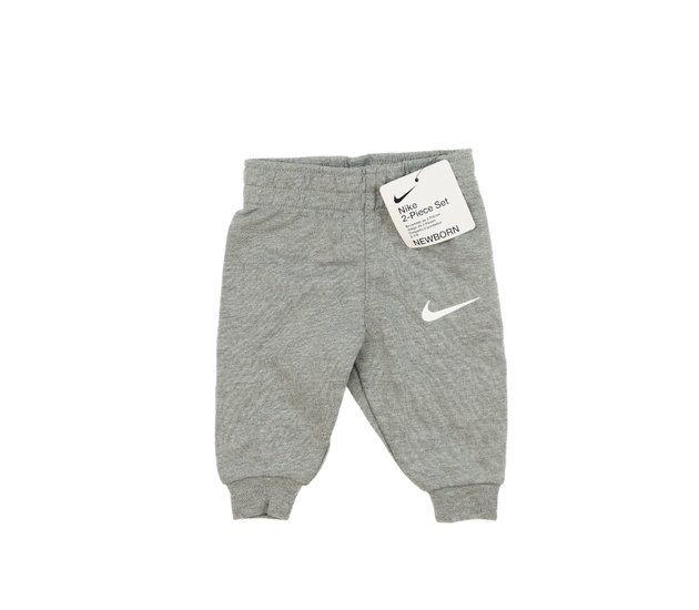 Nové šedé melírované tepláky Nike 