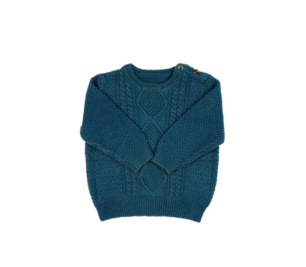 Modrý vzorovaný svetr s nádechem zelené